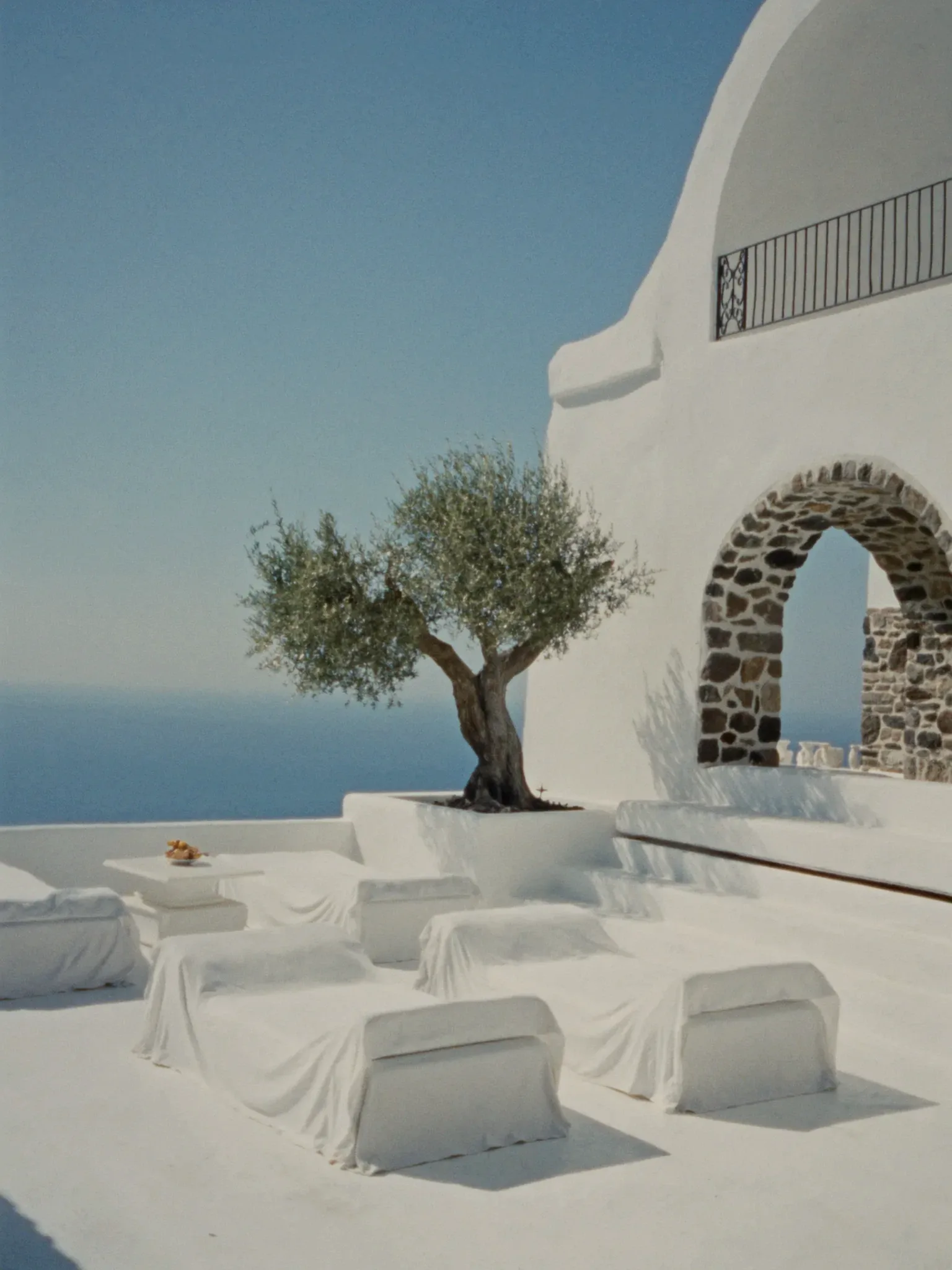 Whitewashed Mediterranean terrace over the sea (placeholder)